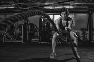 woman exercising in the gym in NYC to build muscle and strength personal training studio